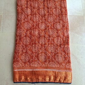 Brown bandhani saree with silk border and contrast blouse - Image 3