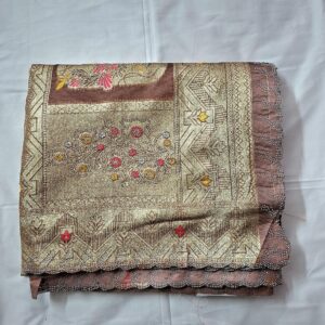 Brown colour tissue saree with full swarovski work, zaree work and cut border
